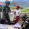 Satgas Yonif 509 Kostrad Dampingi Anak-Anak Papua Belajar Bersama