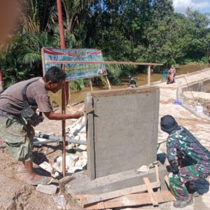 TMMD Kodim 1002 HST Dirikan Tugu Nol Jalan 1030 Meter TMMD Kodim 1002 HST Dirikan Tugu Nol Jalan 1030 Meter