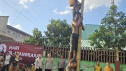 Meriahkan HUT Bhayangkara ke-79, Polsek Cikupa Gelar Lomba Panjat Pinang di Desa Talaga