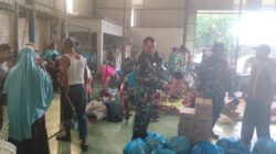 TNI Distribusikan 14.225 Nasi Bungkus untuk Warga Terdampak Banjir di Medan