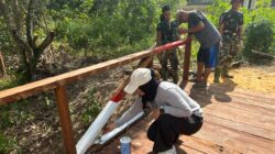 TNI dan Warga Kompak, Pembangunan Jembatan TMMD Ke-128 Kodim 0908/Bontang Memasuki Tahap Pengecatan