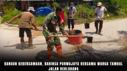 Bangun Kebersamaan, Babinsa Purwajaya Bersama Warga Tambal Jalan Berlubang