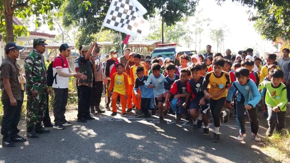Koramil Wonomerto Kawal Dan Amankan Gelaran Lomba Lari Antar Lembaga Pendidikan Dalam Rangka HUT RI Ke 81